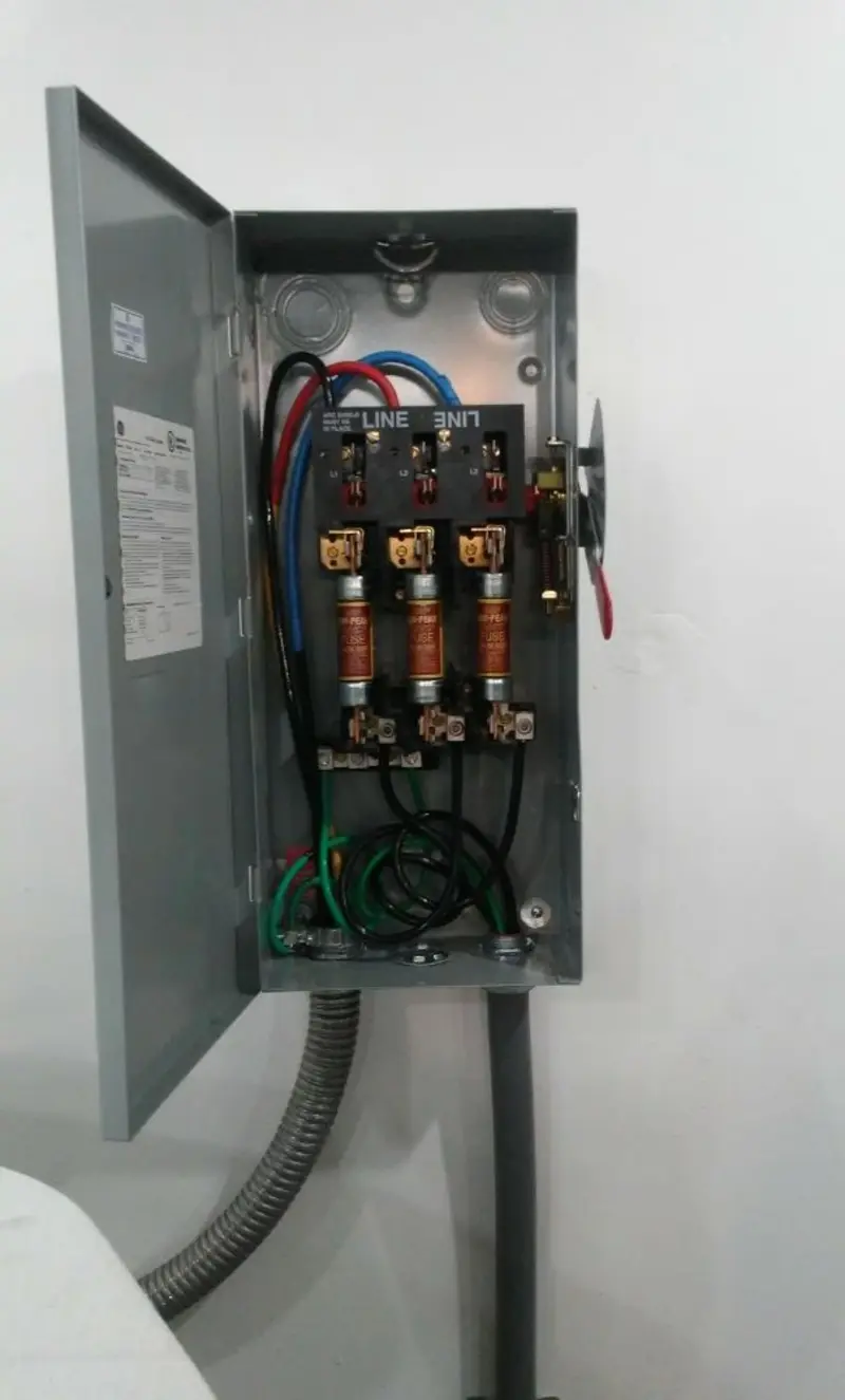 Three-phase disconnect switch installed for Smoke Detector Installation in New Rochelle